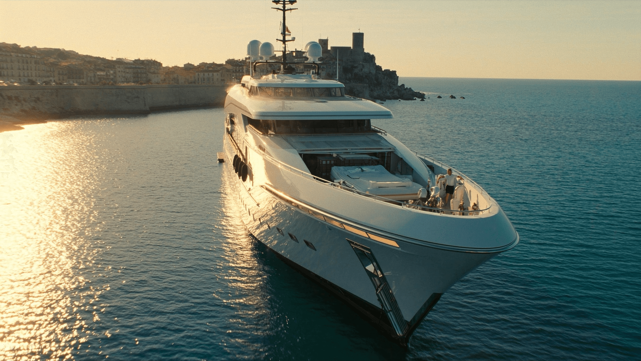 Yacht at anchor, satellite domes visible